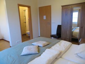 Voodi või voodid majutusasutuse Guesthouse Vellir toas