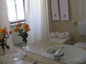 Koupelna v ubytování Hotel Comendador