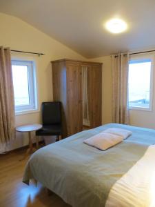 Voodi või voodid majutusasutuse Guesthouse Vellir toas