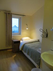 Voodi või voodid majutusasutuse Guesthouse Vellir toas
