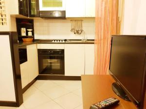 Kuchyň nebo kuchyňský kout v ubytování Catania house Apartment