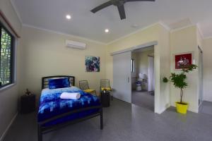 Postel nebo postele na pokoji v ubytování Daintree Peaks ECO Stays + 37 fotografií