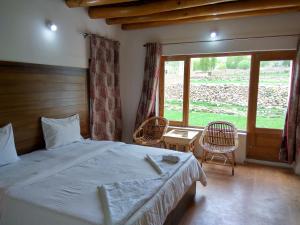 Postel nebo postele na pokoji v ubytování Shaolin Ladakh