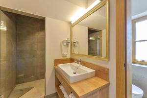 Ein Badezimmer in der Unterkunft Posthotel Hofherr