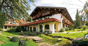 Ein Garten an der Unterkunft Posthotel Hofherr