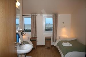 Voodi või voodid majutusasutuse Guesthouse Vellir toas