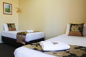 Ένα ή περισσότερα κρεβάτια σε δωμάτιο στο Motel 359
