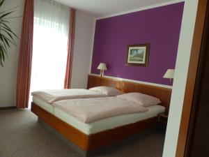 Ein Bett oder Betten in einem Zimmer der Unterkunft Hotel Dorotheenhof