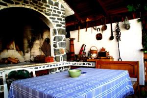 a kitchen with a table with a bowl on it at Holiday Home Smiljan in Gospić