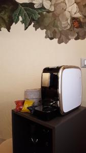 Kuchyň nebo kuchyňský kout v ubytování 15 Quindici by Serendipity Rooms + 32 fotografií