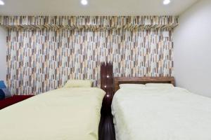 Postel nebo postele na pokoji v ubytování House In Azabu