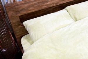 Postel nebo postele na pokoji v ubytování House In Azabu