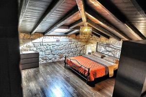 Postel nebo postele na pokoji v ubytování Sunstone Villas