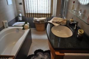 A bathroom at Sand 228 Home