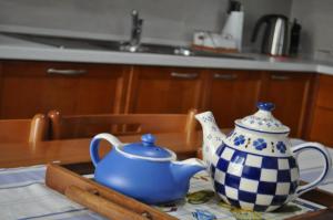 Coffee and tea making facilities at Sand 228 Home