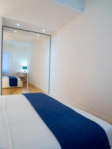 Ένα ή περισσότερα κρεβάτια σε δωμάτιο στο Bartolo Suite Centro Storico Perugia