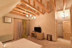 TV a/nebo společenská místnost v ubytování Lacul Verde Resort
