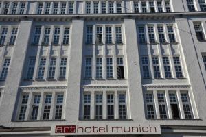 a building with windows and a sign on it at Arthotel Munich in Munich