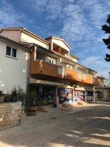 a building on the side of a street at Natura A1 in Medulin