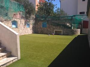 Zahrada ubytování Apartment Igralište Mirakul