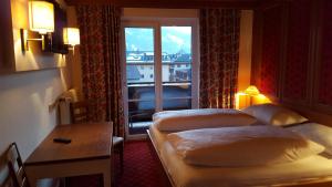 Posteľ alebo postele v izbe v ubytovaní Hotel Lukashansl
