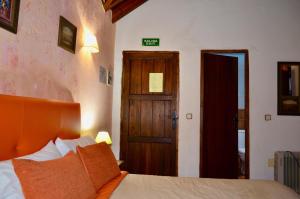 Postel nebo postele na pokoji v ubytování Hotel Restaurante Bandolero