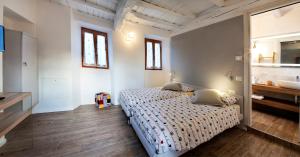 Postel nebo postele na pokoji v ubytování Al Rost B&B