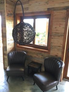 Posezení v ubytování Hotel 381 Panguipulli