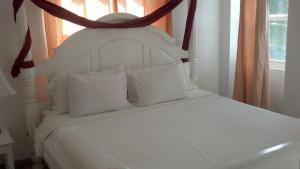 Katil atau katil-katil dalam bilik di Paradise Cove