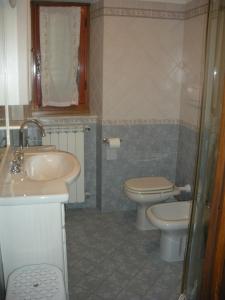 Ванна кімната в Appartamento La Volpe