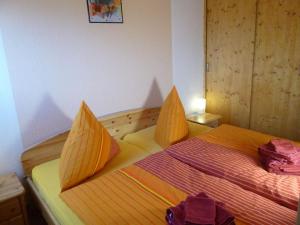 Postel nebo postele na pokoji v ubytování Ferienhaus "Finkennest"