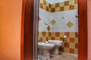 Vonios kambarys apgyvendinimo įstaigoje Fiori e Limoni