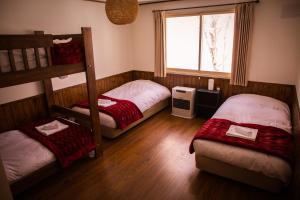Postel nebo postele na pokoji v ubytování Annupuri Oasis Lodge