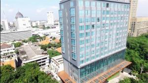 an aerial view of a tall building in a city at Aria Centra Surabaya in Surabaya