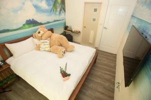 Postel nebo postele na pokoji v ubytování Hai Yang Homestay