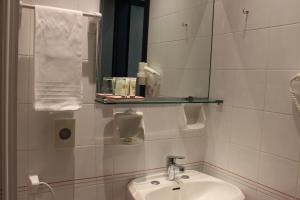 Koupelna v ubytování Hotel Miramare