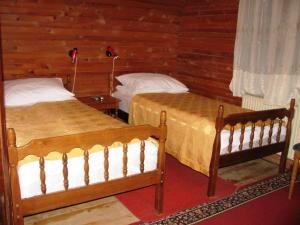 Katil atau katil-katil dalam bilik di MB Hotel