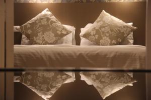Кровать или кровати в номере Iliani Hotel