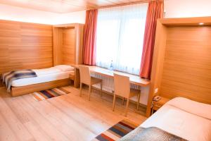 Postel nebo postele na pokoji v ubytování Hotel La Villa