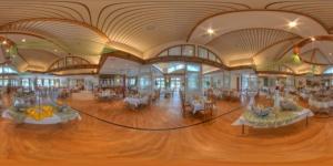 a large room with wooden floors and a large building at Hotel-Landrestaurant Schnittker in Delbrück +17 photos