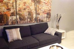 A seating area at Apartamento en Playa de las Burras