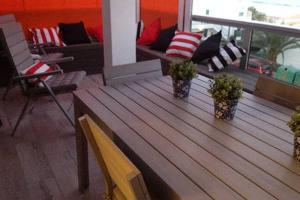 A seating area at Apartamento en Playa de las Burras