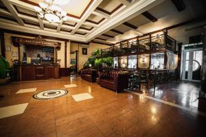 a large room with a lobby with a large room with a lobby at Stariy Rostov Hotel in Rostov on Don