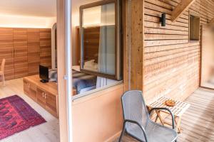 TV a/nebo společenská místnost v ubytování Hotel La Villa