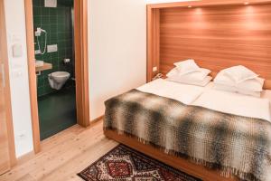 Postel nebo postele na pokoji v ubytování Hotel La Villa