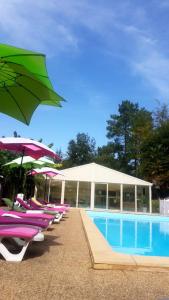 The swimming pool at or close to Les Hauts de Lastours