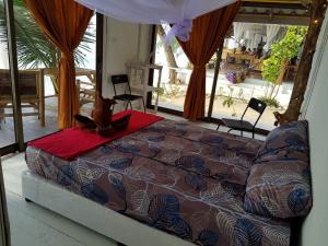 Postel nebo postele na pokoji v ubytování Haad Chao Phao Resort