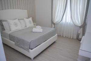 A bed or beds in a room at B&B Pompei Passion