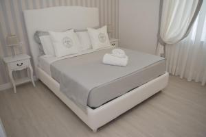 A bed or beds in a room at B&B Pompei Passion