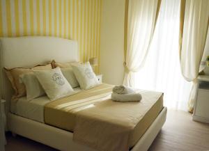 A bed or beds in a room at B&B Pompei Passion